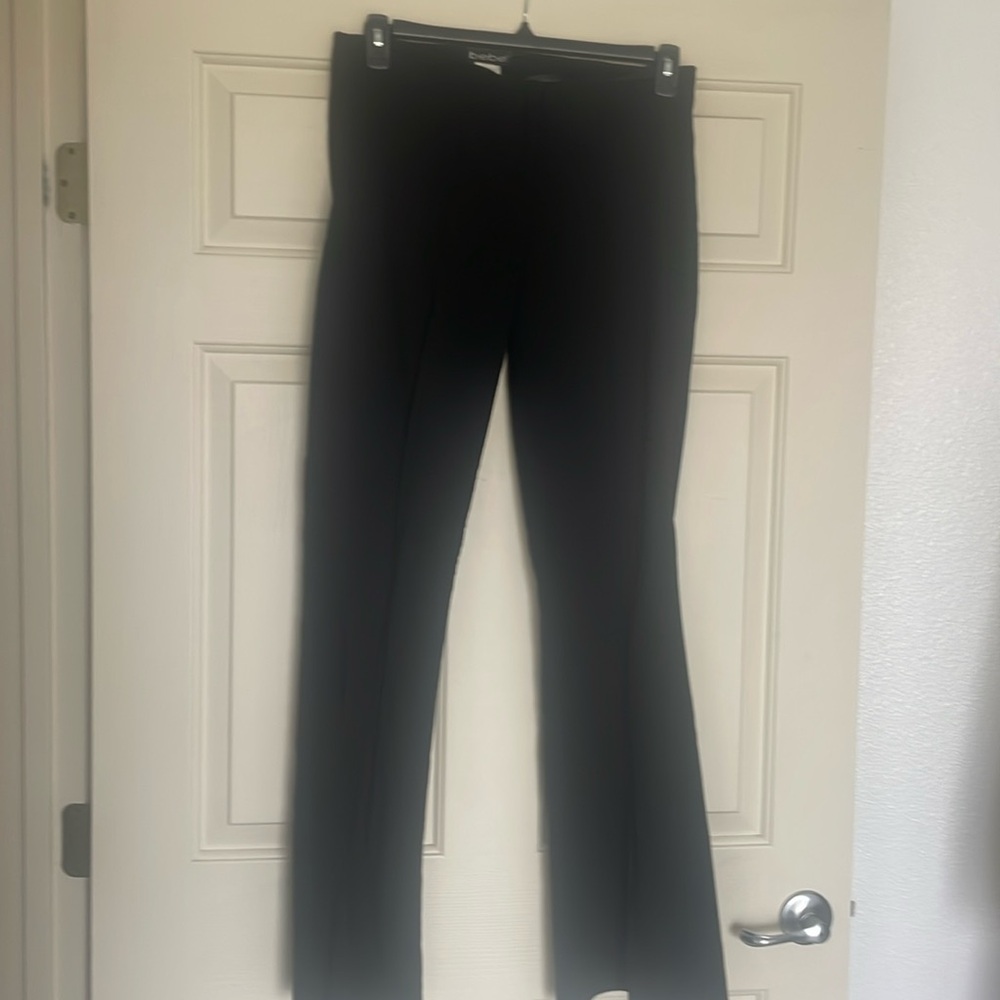 BEBÉ black slacks with flare